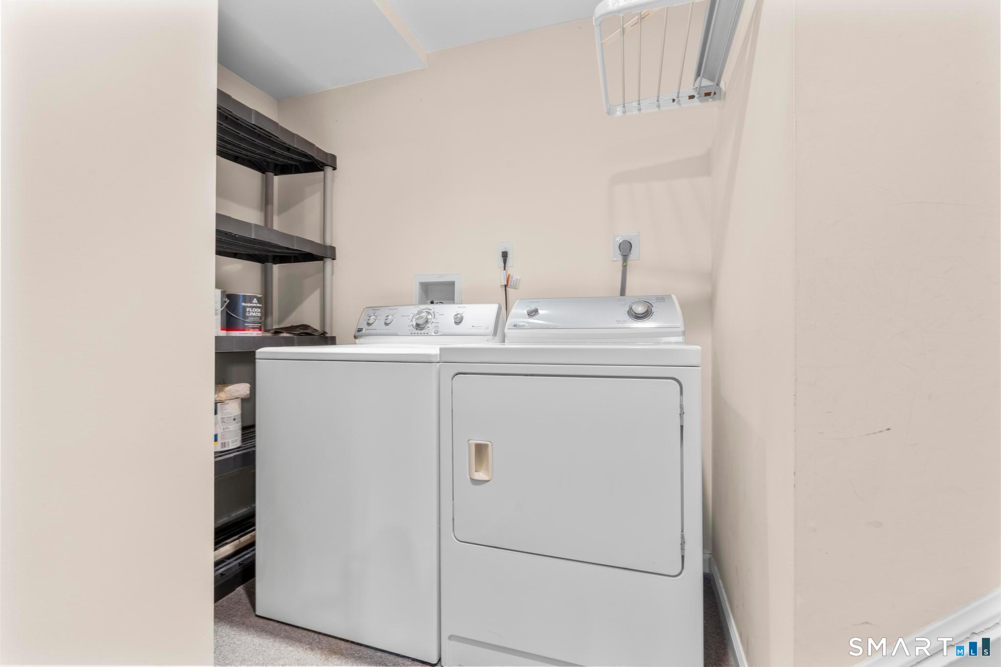 168 Colonial Road, Unit 6 Stamford, CT 06906 - Photo 23 of 41 a utility room with dryer and washer