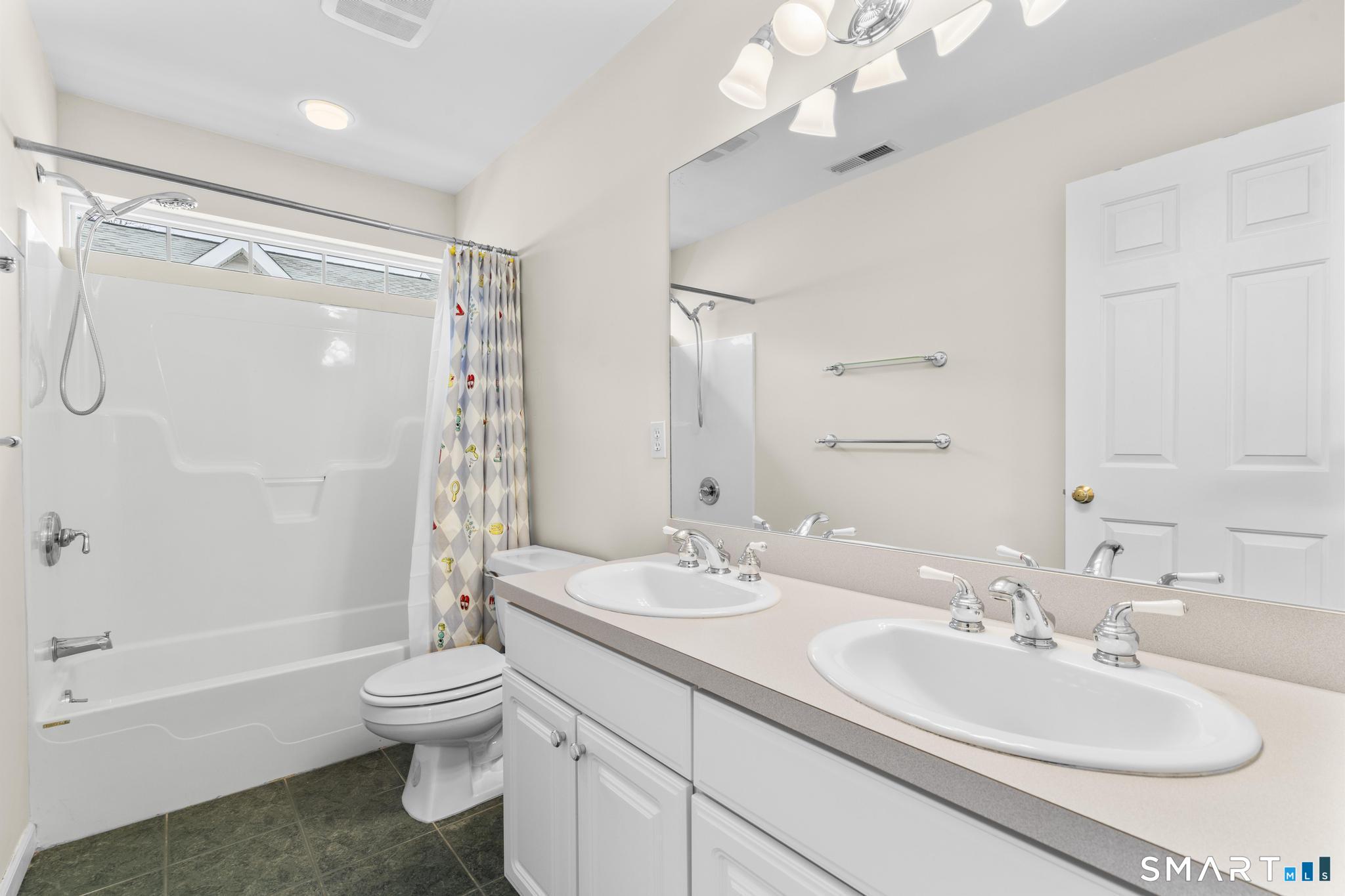 168 Colonial Road, Unit 6 Stamford, CT 06906 - Photo 32 of 41 a bathroom with a sink toilet tub and shower