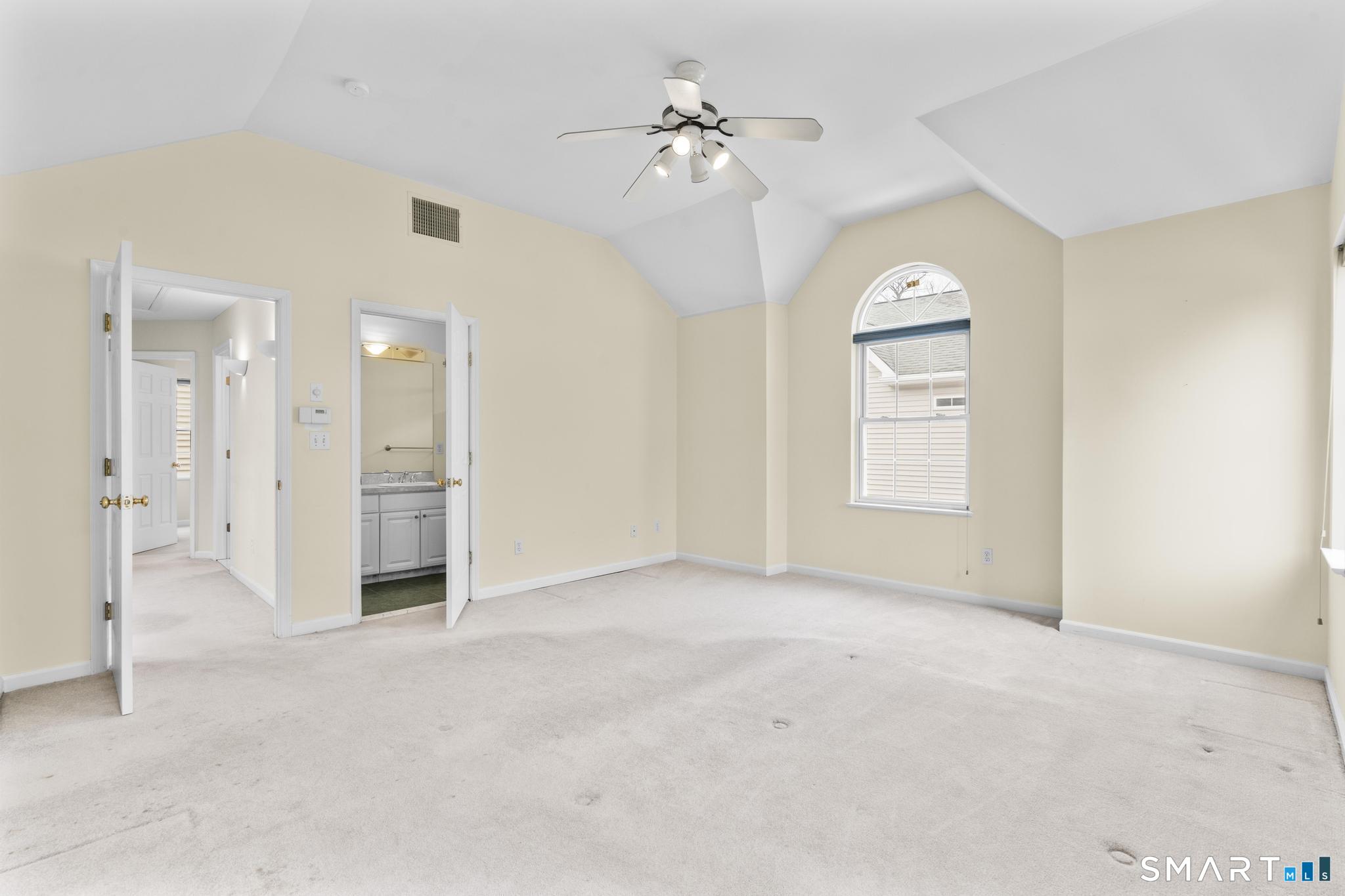 168 Colonial Road, Unit 6 Stamford, CT 06906 - Photo 33 of 41 an empty room with fan and entrance