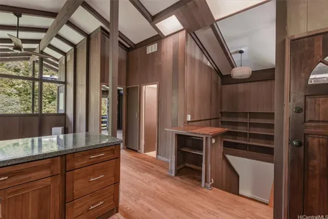 a view of cabinets and wooden floor