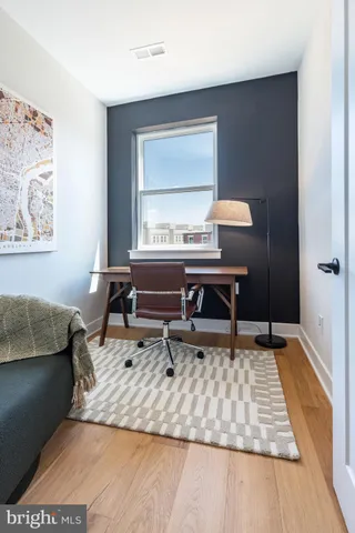 a living room with a couch and a table