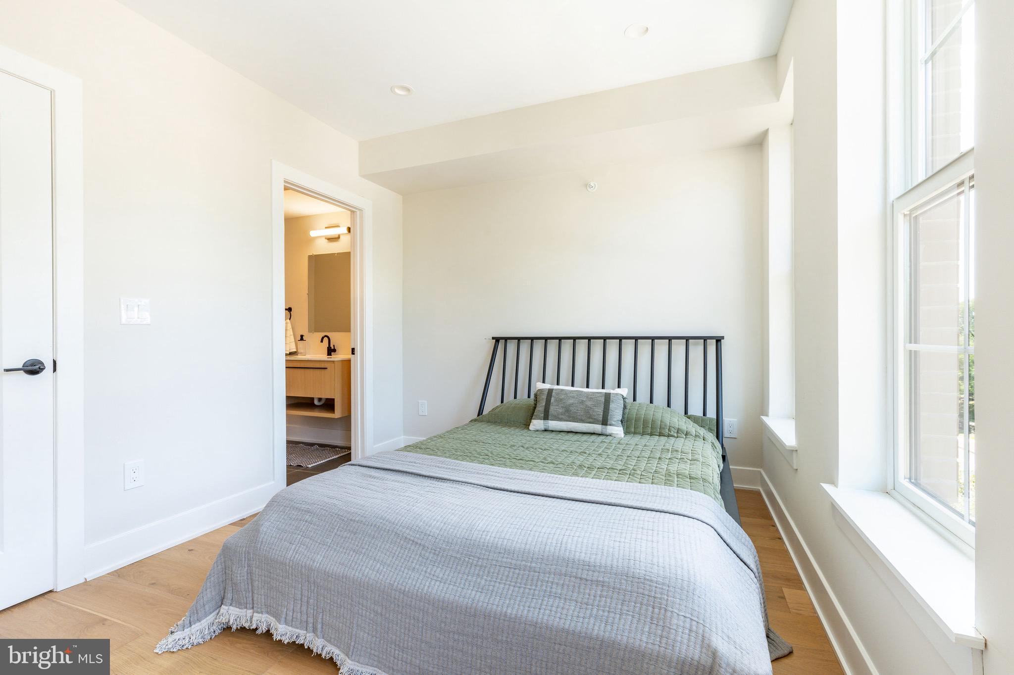 3845 Ridge Avenue Philadelphia, PA 19132 - Photo 17 of 31 a bedroom with a bed and a window