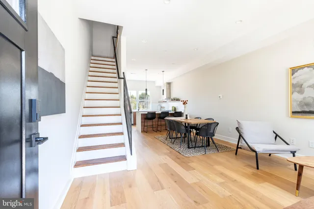 a view of a livingroom with furniture and lounge chair