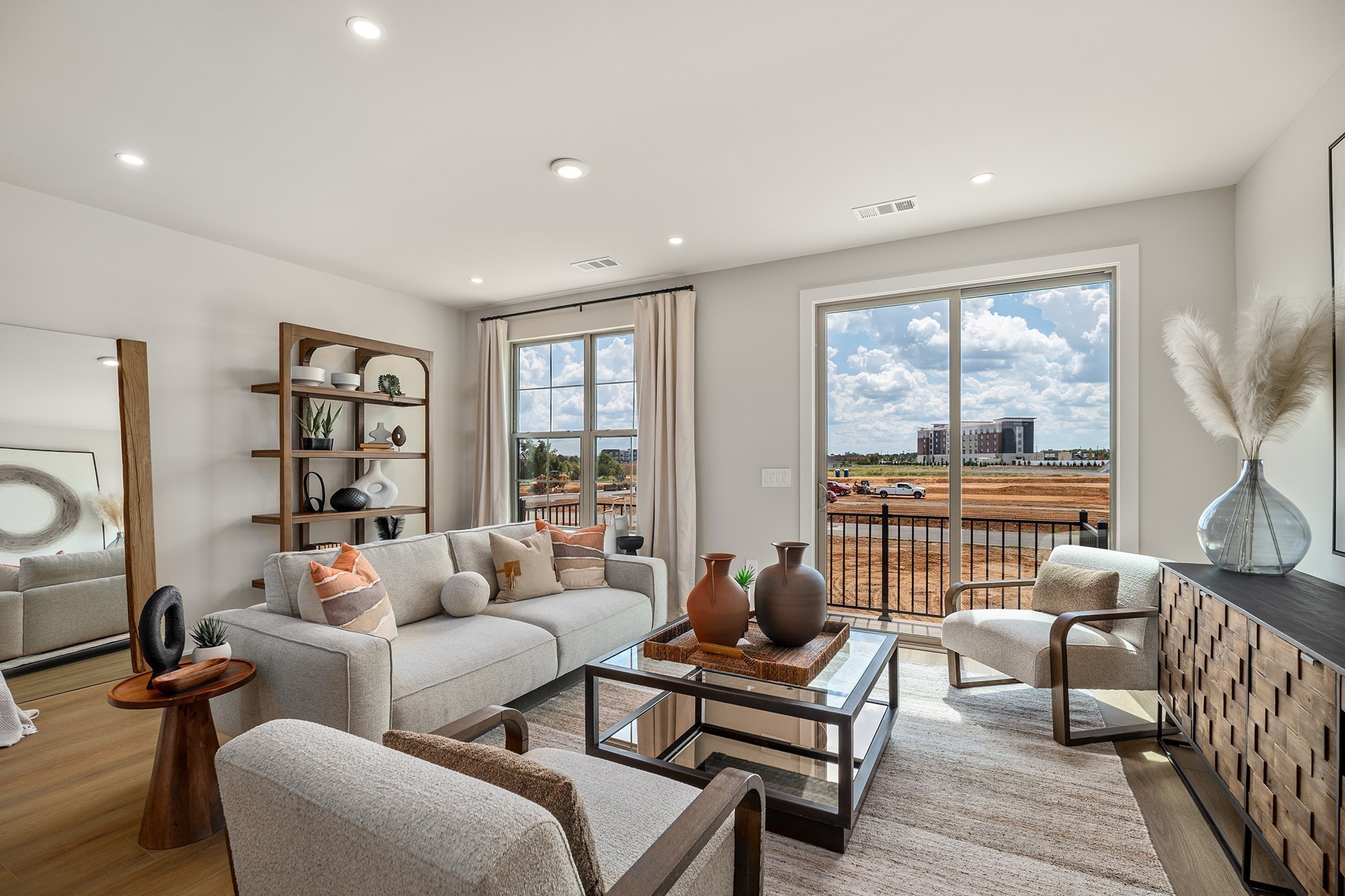 2615 Wilkinson Pike, Unit 1402 Murfreesboro, TN 37129 - Photo 12 of 43 a living room with furniture and a floor to ceiling window