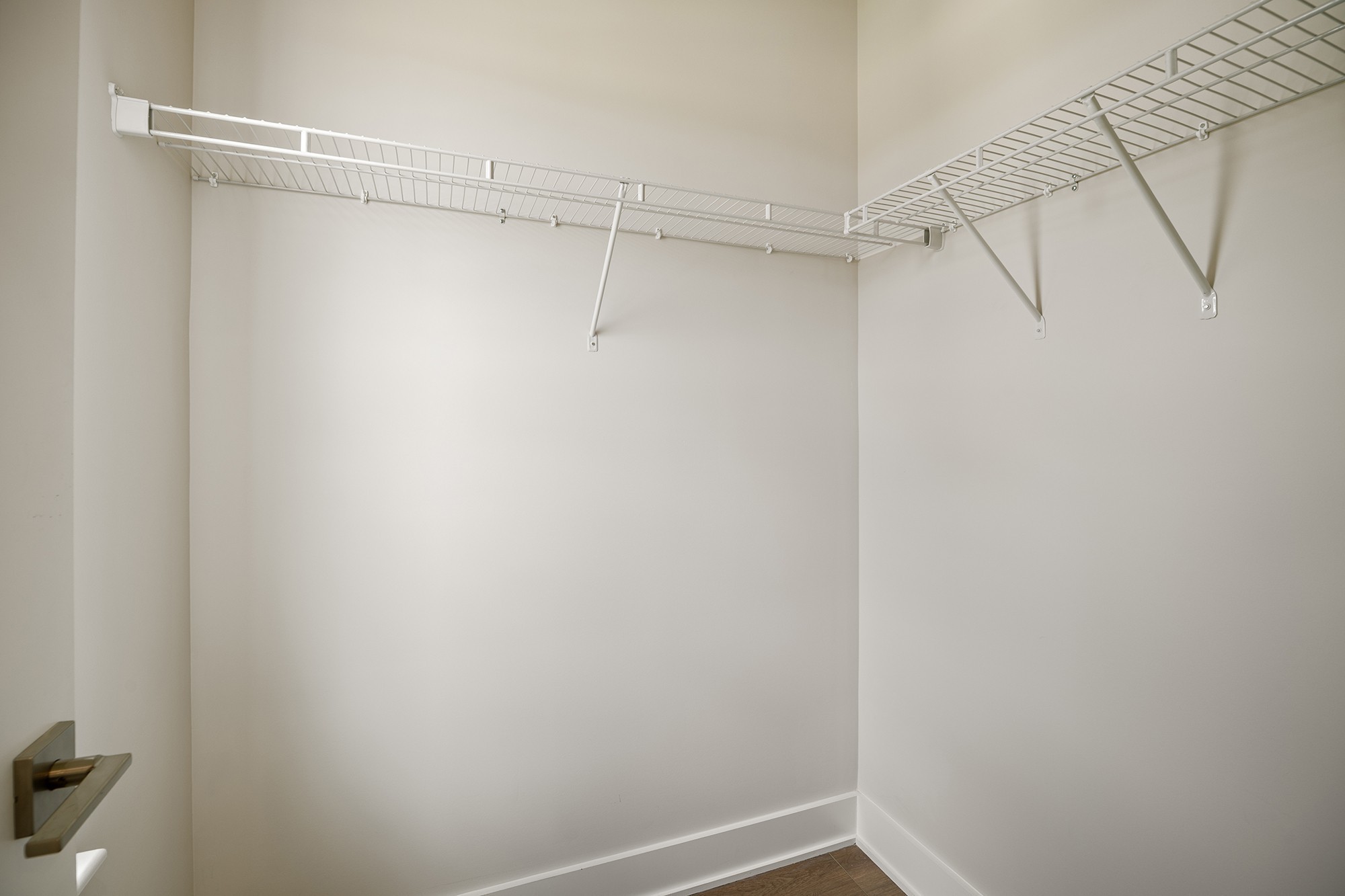 2615 Wilkinson Pike, Unit 1402 Murfreesboro, TN 37129 - Photo 31 of 43 a view of a room with racks on the wall