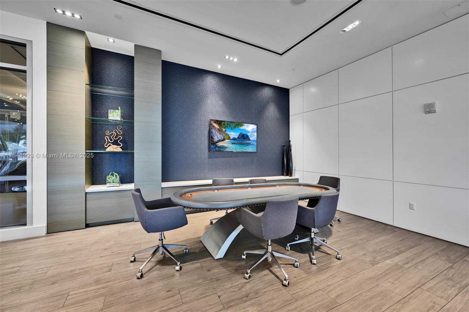 17111 Biscayne Boulevard, Unit 207 North Miami Beach, FL 33160 - Photo 25 of 54 a view of a dining room with furniture and wooden floor