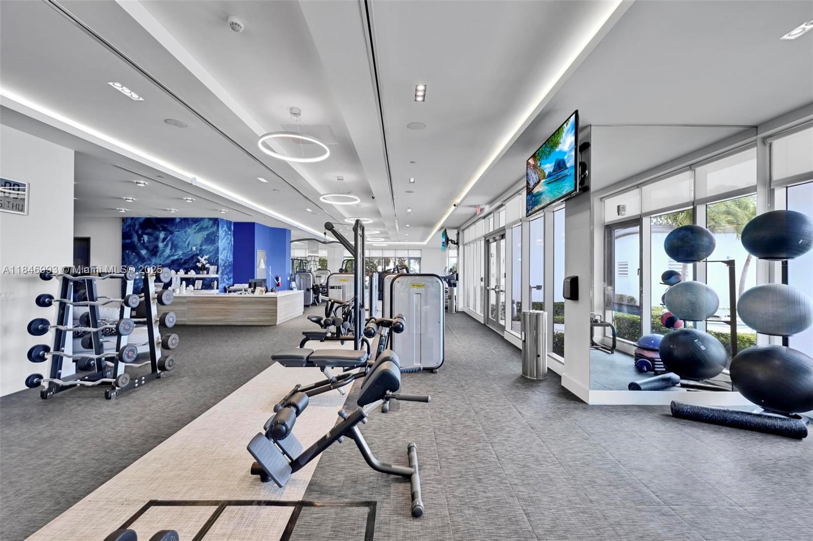 17111 Biscayne Boulevard, Unit 207 North Miami Beach, FL 33160 - Photo 31 of 54 a view of a room with gym equipment