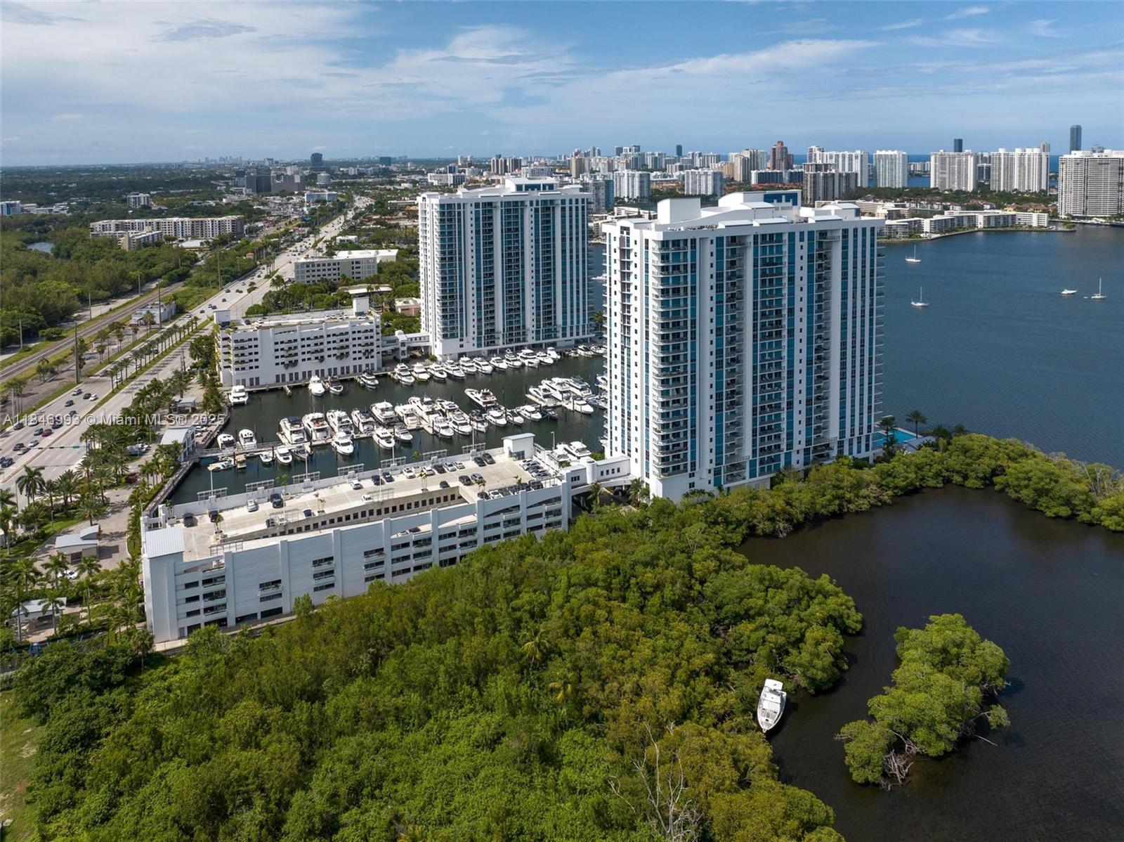 17111 Biscayne Boulevard, Unit 207 North Miami Beach, FL 33160 - Photo 44 of 54 a city view with tall buildings