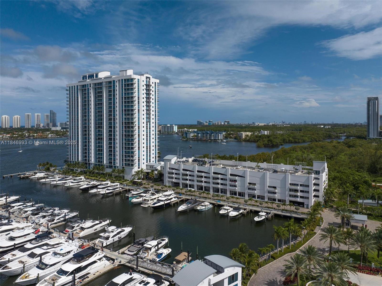 17111 Biscayne Boulevard, Unit 207 North Miami Beach, FL 33160 - Photo 50 of 54 a view of a lake with tall buildings