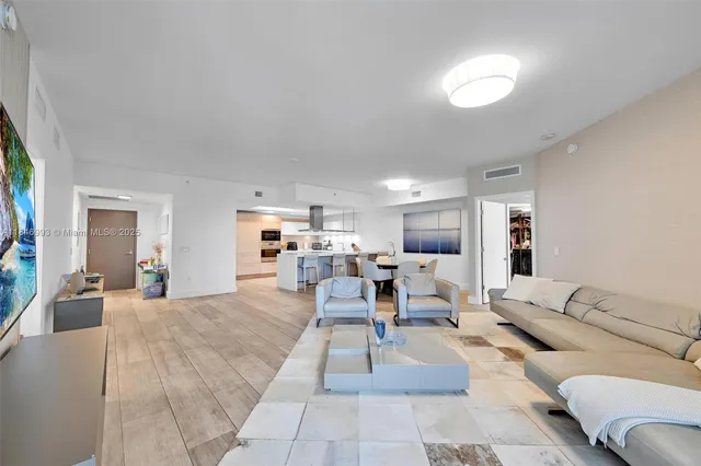 a living room with furniture and a couch