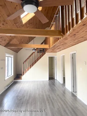 a view of entryway with stairs