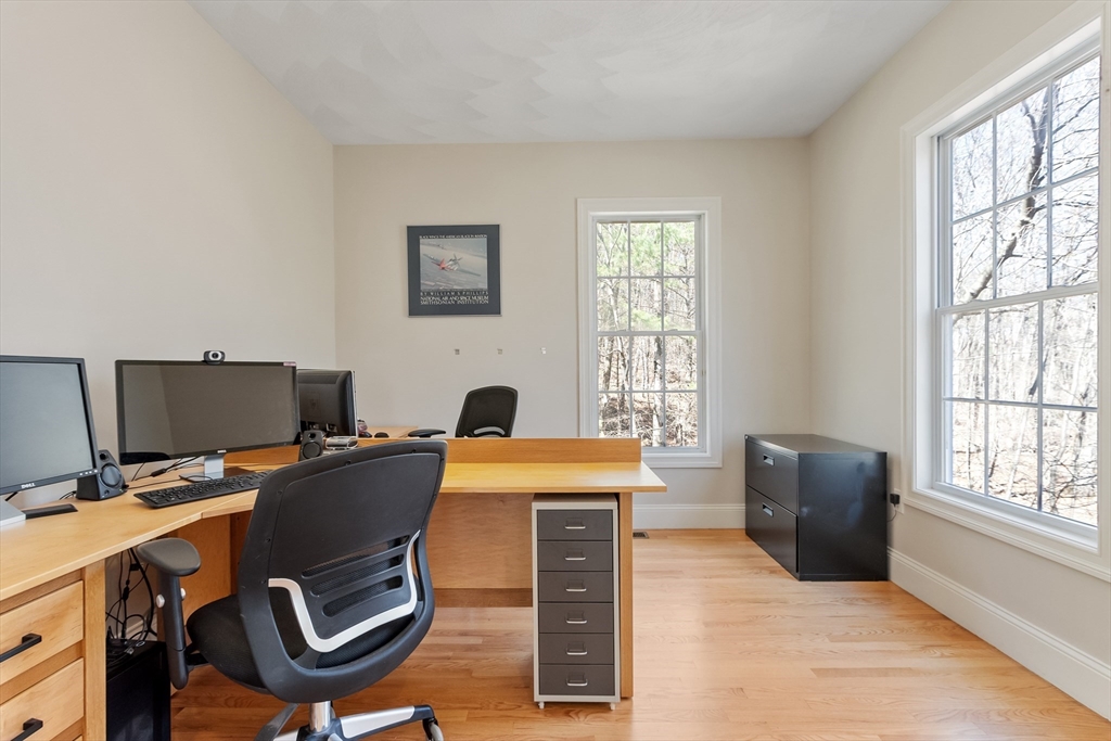 18 Danforth Lane Bolton, MA 01740 - Photo 13 of 29 a workspace with furniture and a window