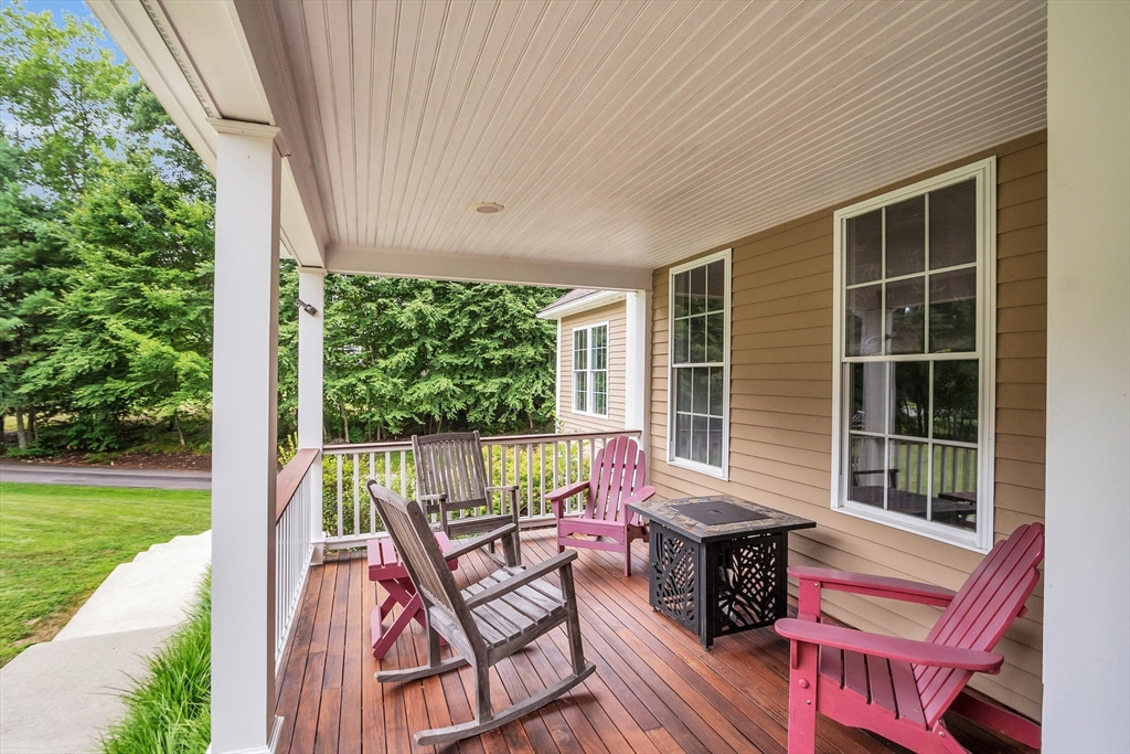 18 Danforth Lane Bolton, MA 01740 - Photo 26 of 29 a view of a two chairs in the deck