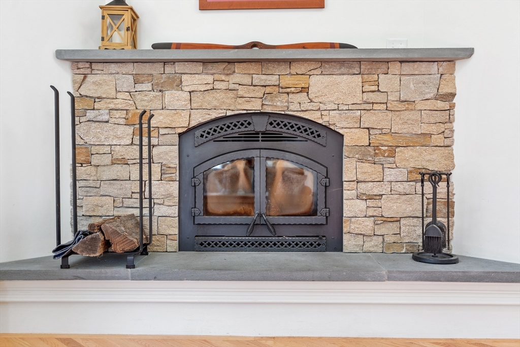 18 Danforth Lane Bolton, MA 01740 - Photo 9 of 29 a close view of a fireplace