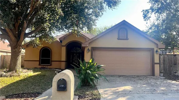 a front view of house with yard