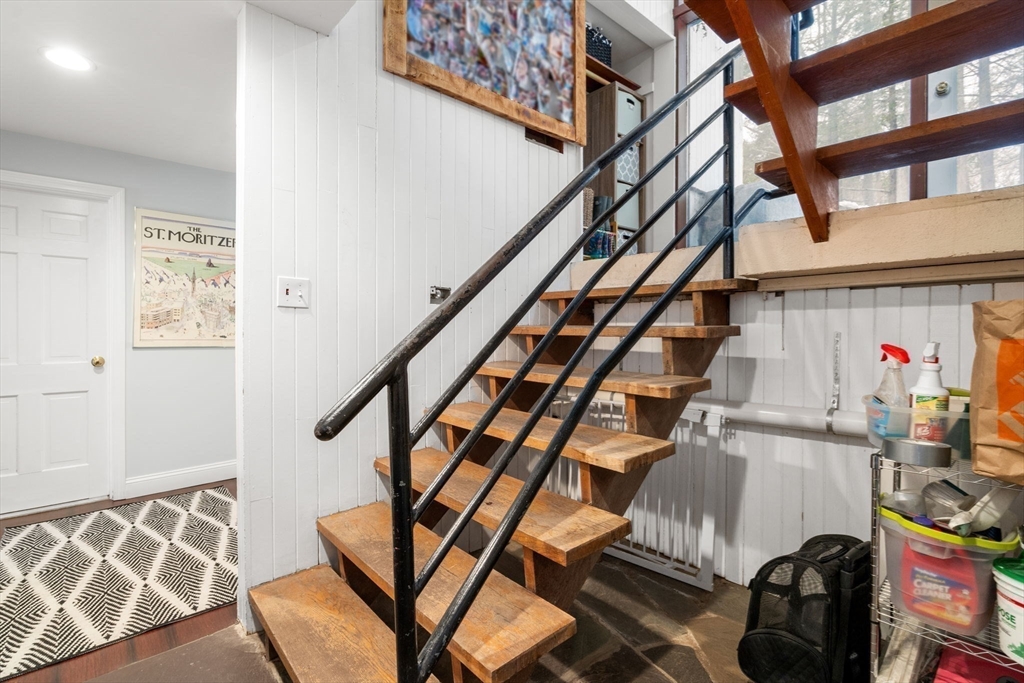 56 Millbrook Road Medfield, MA 02052 - Photo 17 of 28 a view of entryway with wooden floor and stairs