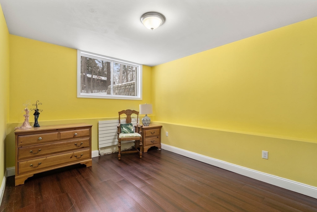 56 Millbrook Road Medfield, MA 02052 - Photo 18 of 28 a living room with furniture and wooden floor