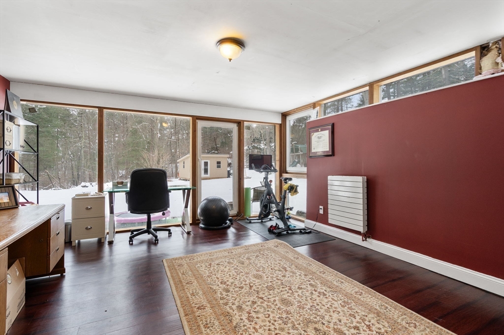 56 Millbrook Road Medfield, MA 02052 - Photo 19 of 28 a view of a livingroom with workspace and a window