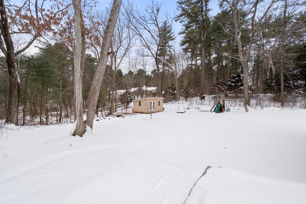 56 Millbrook Road Medfield, MA 02052 - Photo 28 of 28 a view of snow on the road
