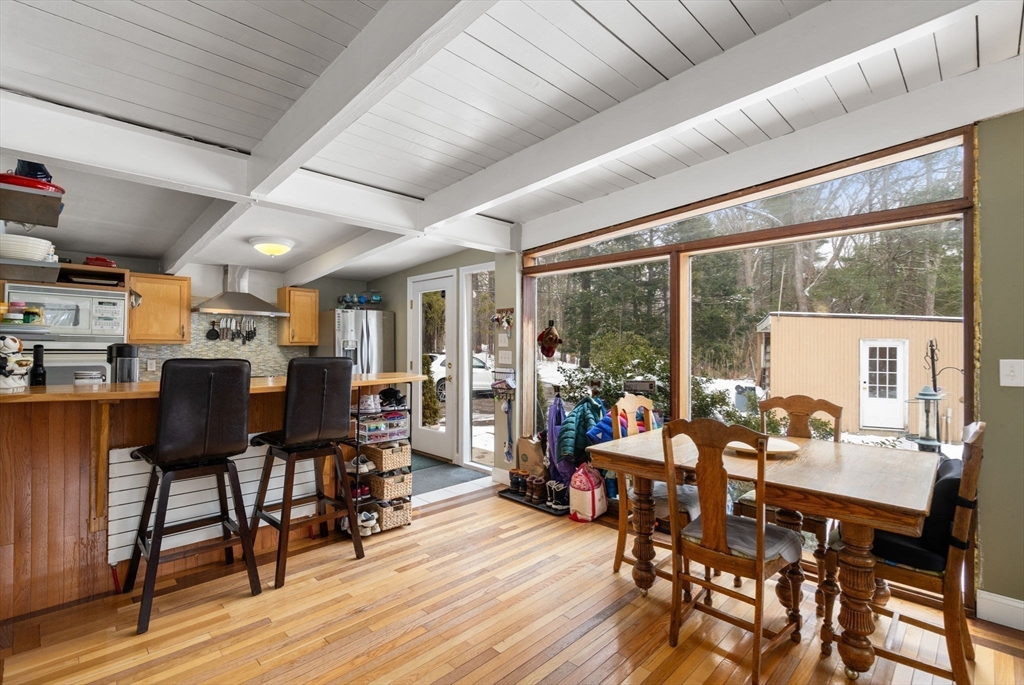 56 Millbrook Road Medfield, MA 02052 - Photo 8 of 28 a view of a dining room with furniture window and wooden floor