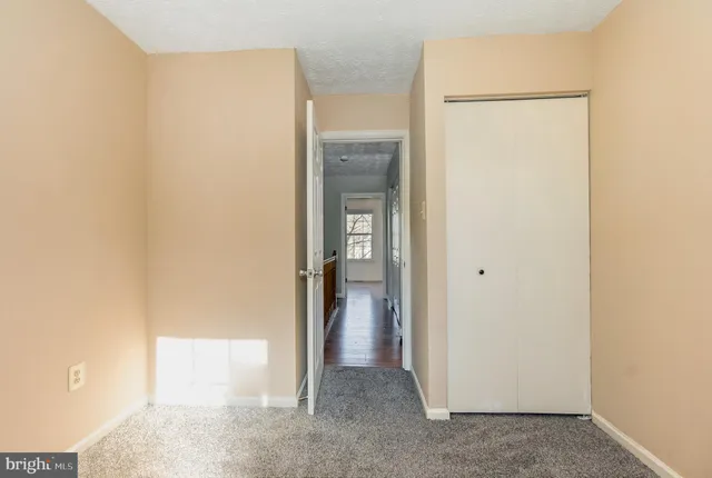 a view of a room with an empty space