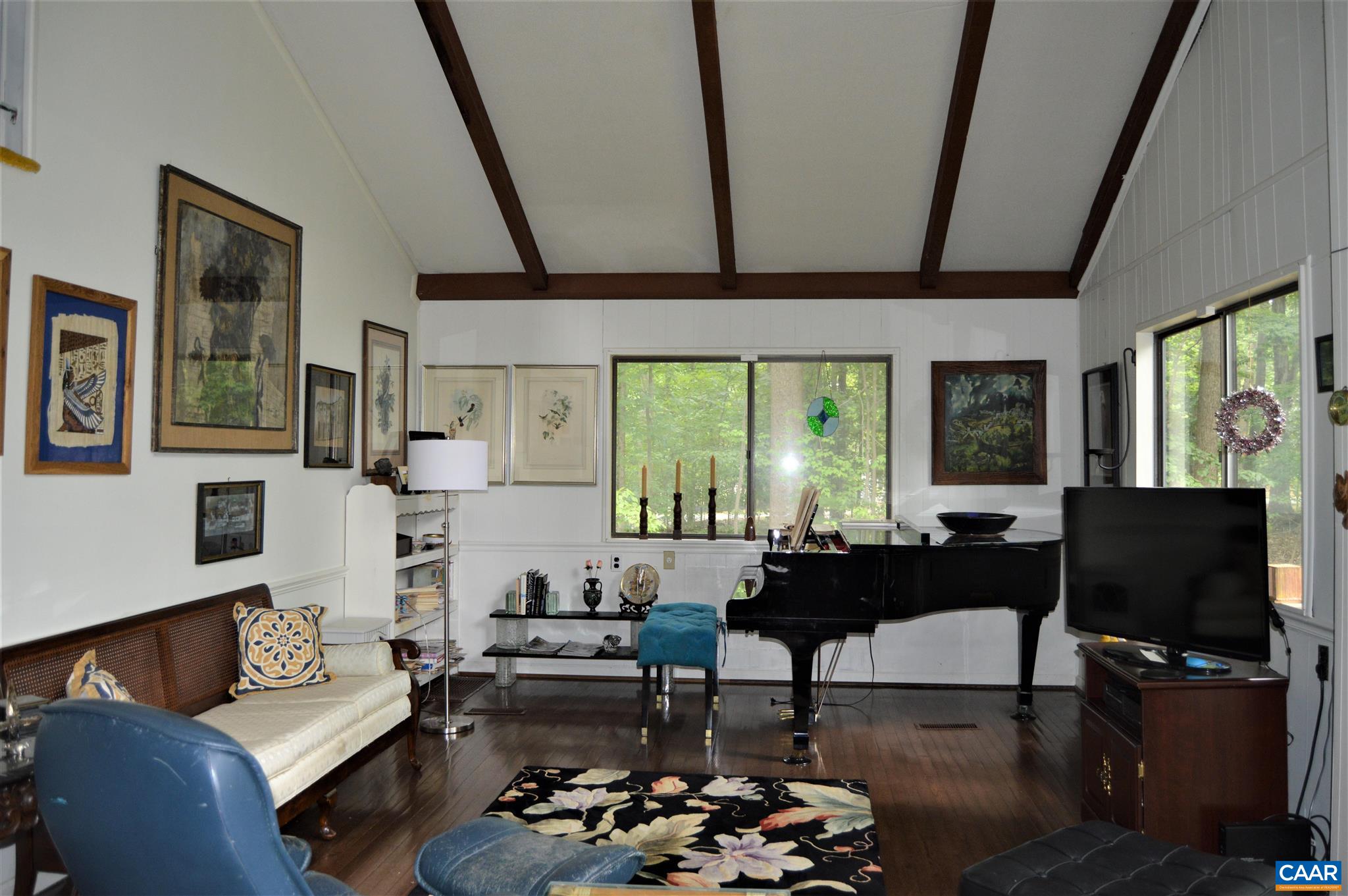 4 Condor Road Palmyra, VA 22963 - Photo 6 of 14 a living room with furniture and a flat screen tv