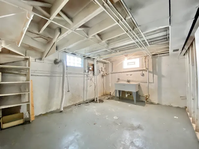 a view of a room with wooden walls