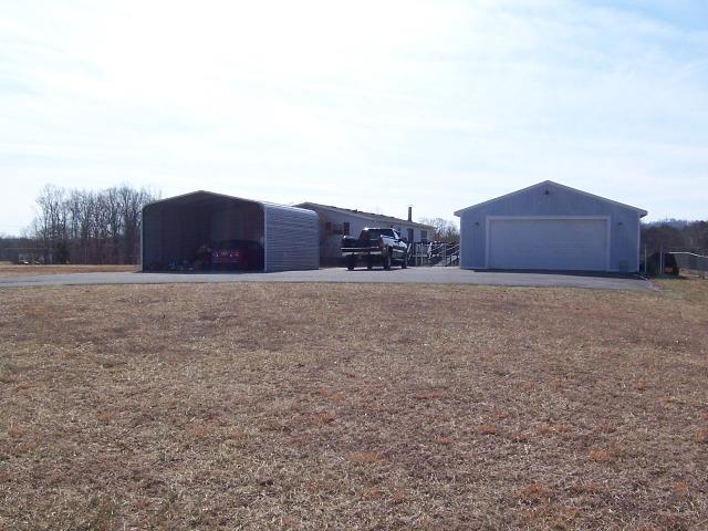 3234 Quarles Road Thaxton, VA 24174 - Photo 13 of 16 a view of a couches in front of a house