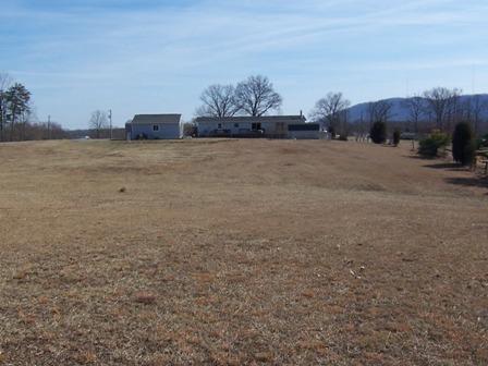 3234 Quarles Road Thaxton, VA 24174 - Photo 16 of 16 a view of a lake with houses