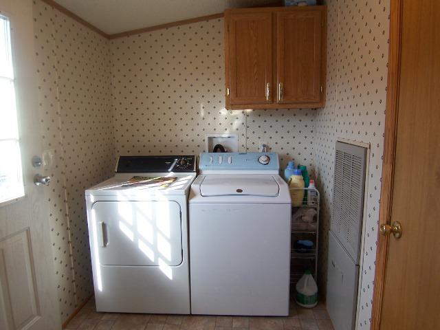 3234 Quarles Road Thaxton, VA 24174 - Photo 7 of 16 a utility room with dryer and washer