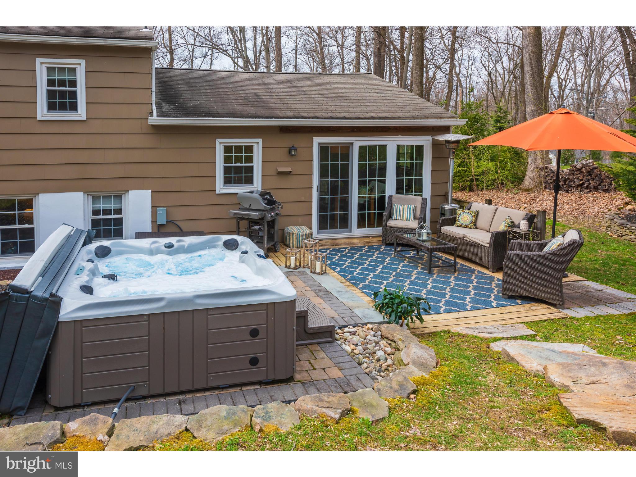 870 Taylor Road Downingtown, PA 19335 - Photo 22 of 24 Hot tub and deck