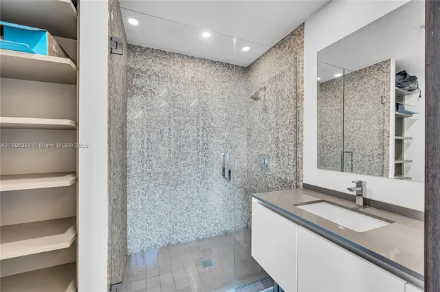 a view of bathroom and a hallway with toilet