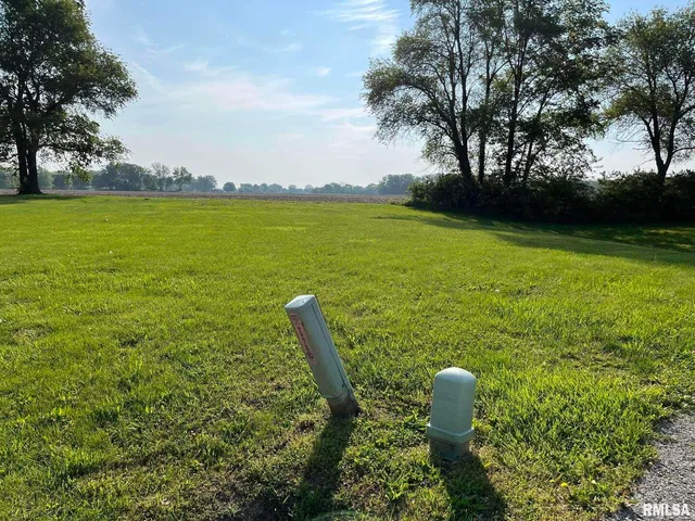 a view of a water from a yard