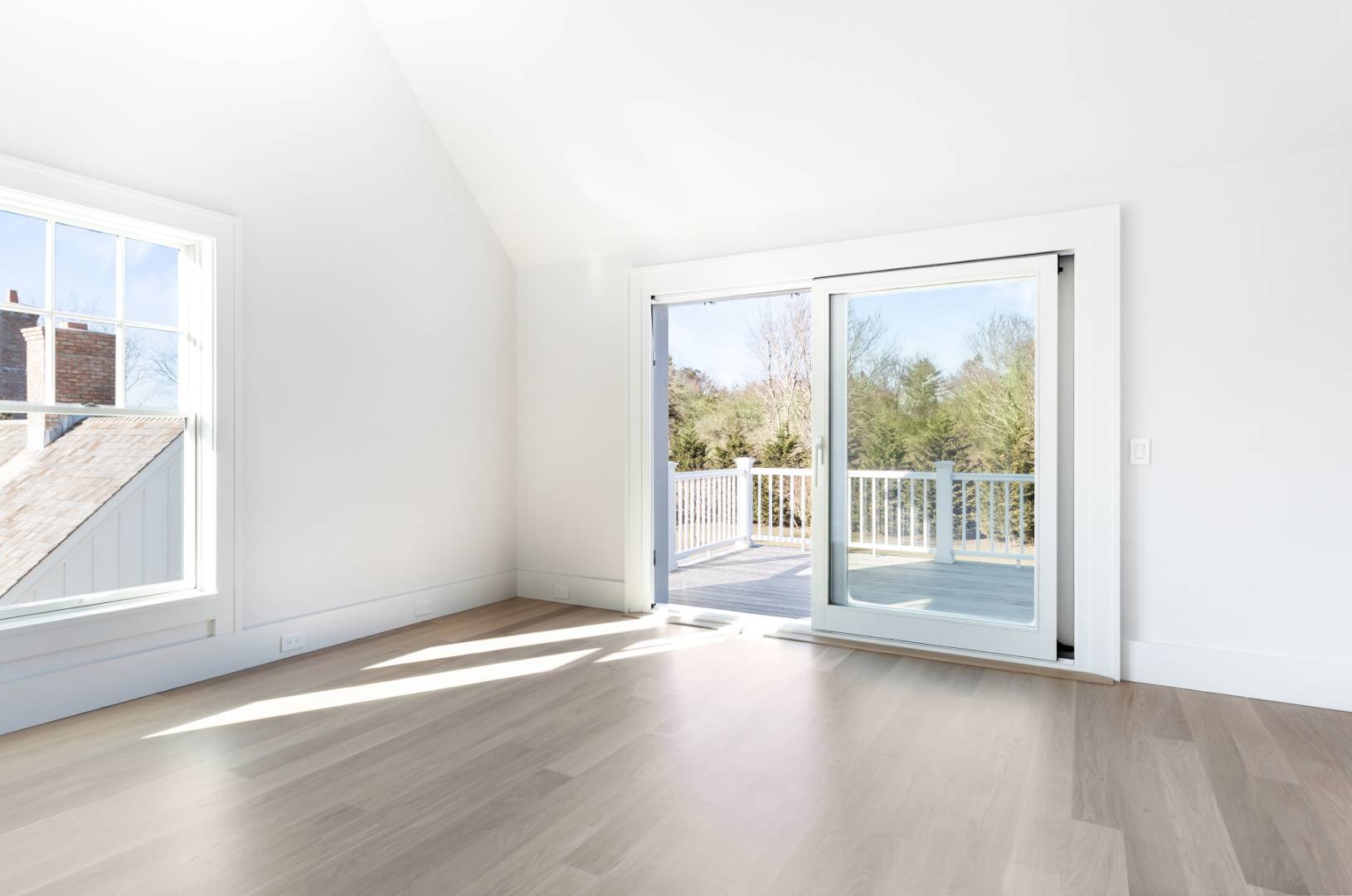 7 Fieldview Lane East Hampton, NY 11937 - Photo 39 of 43 a view of a room with wooden floor and window
