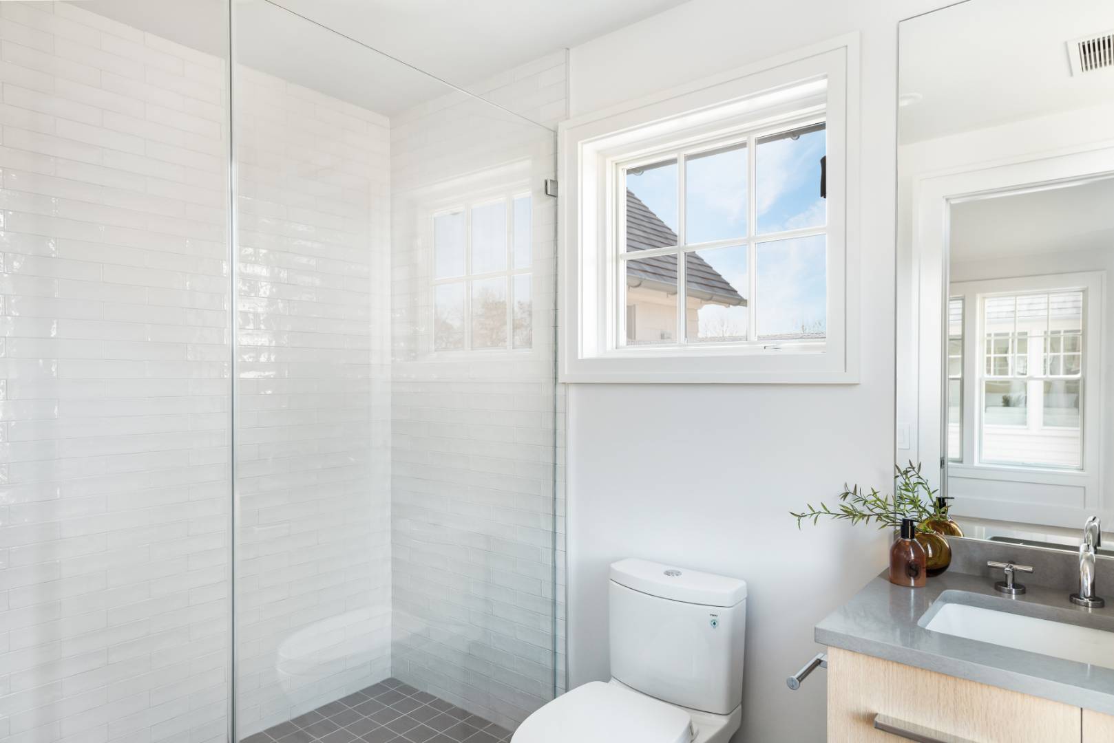 7 Fieldview Lane East Hampton, NY 11937 - Photo 40 of 43 a bathroom with a toilet a sink and a window