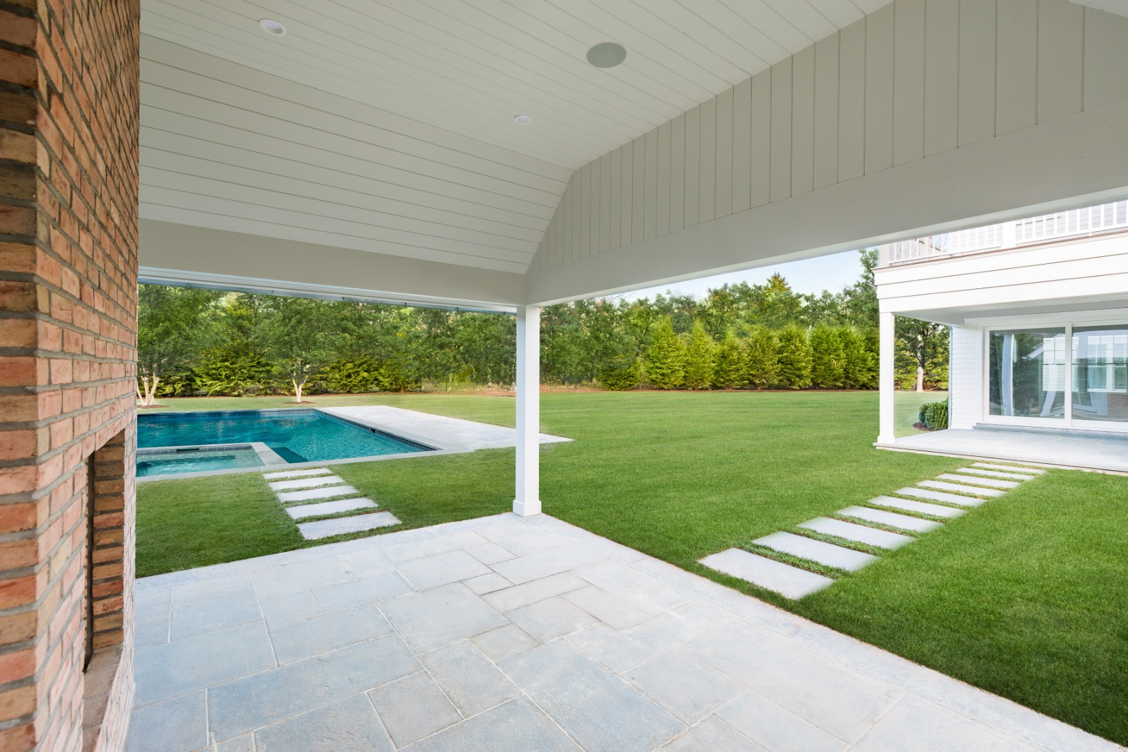 7 Fieldview Lane East Hampton, NY 11937 - Photo 7 of 43 a view of a porch with a yard
