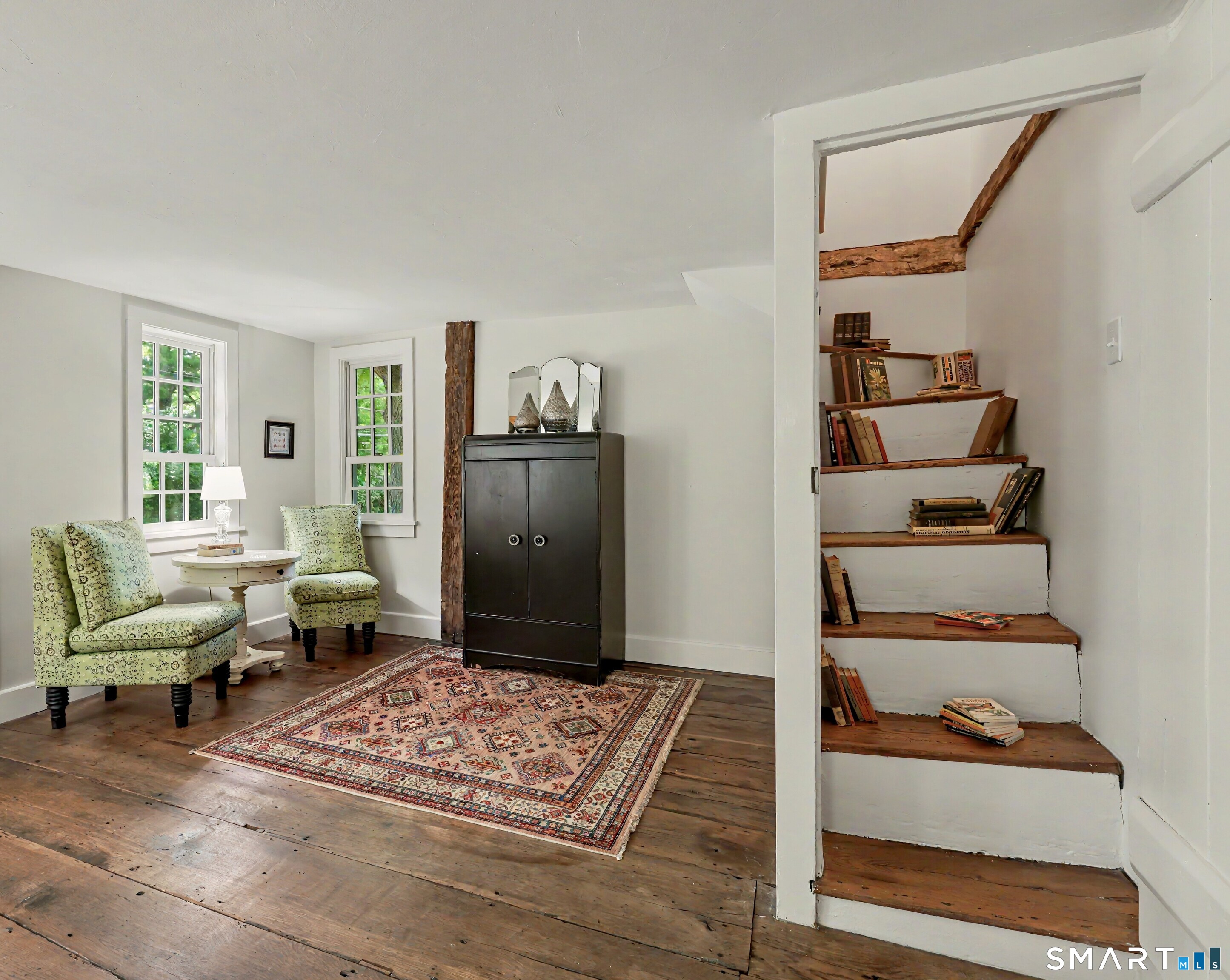 183 Range Road Wilton, CT 06897 - Photo 10 of 40 Charming original staircase is now cleverly used as a library