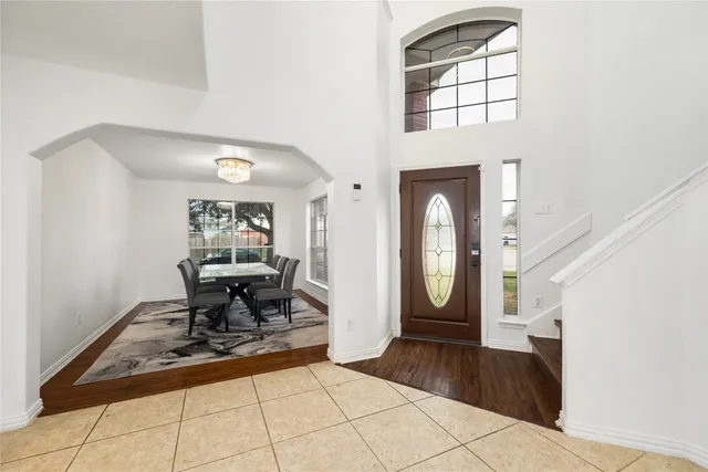 a view of livingroom with furniture and workspace
