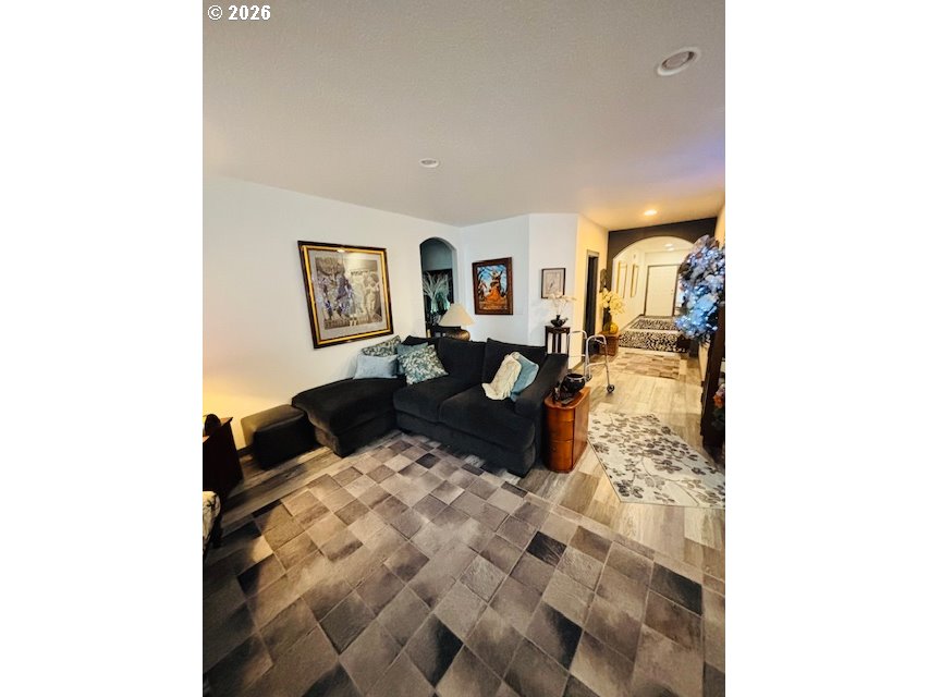 5367 Elk Ridge Drive Eugene, OR 97402 - Photo 18 of 31 a living room with couches and painting on the wall