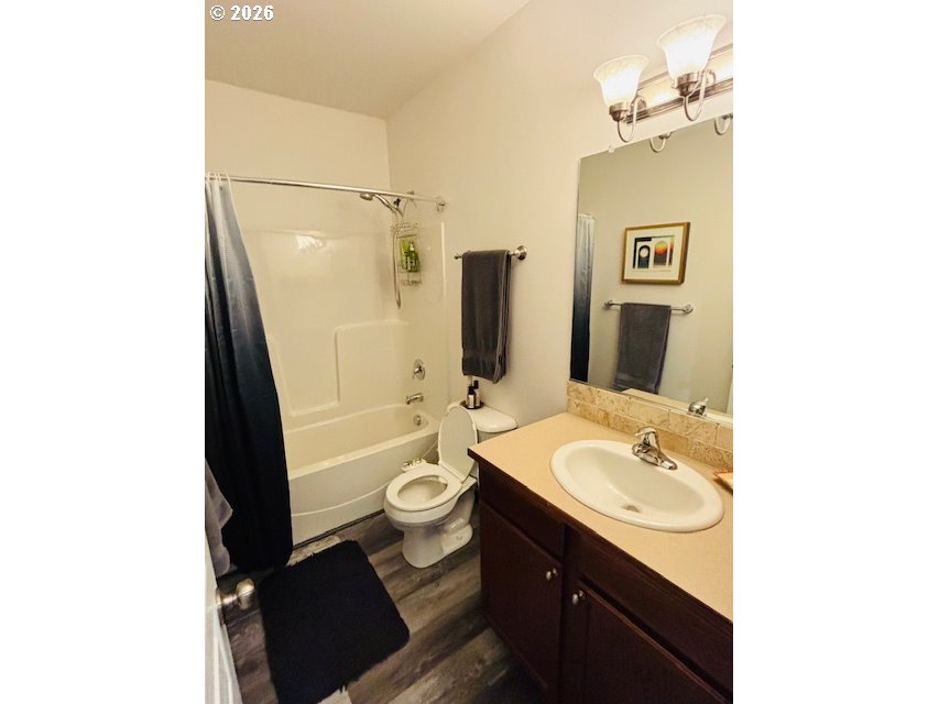 5367 Elk Ridge Drive Eugene, OR 97402 - Photo 3 of 31 a bathroom with a granite countertop sink toilet and shower