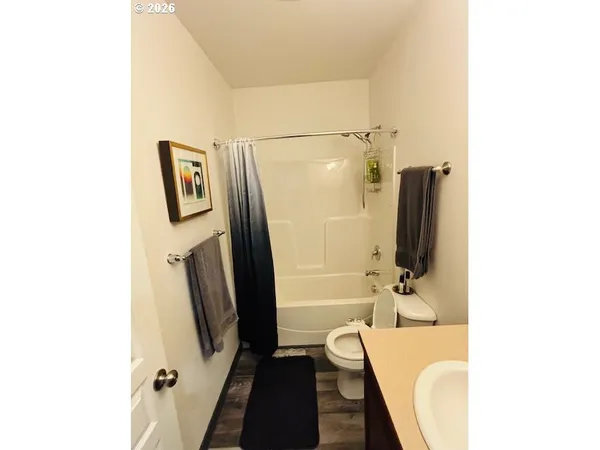 a view of workspace with wooden floor washer and dryer