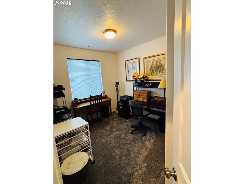 5367 Elk Ridge Drive Eugene, OR 97402 - Photo 5 of 31 a view of workspace with wooden floor washer and dryer