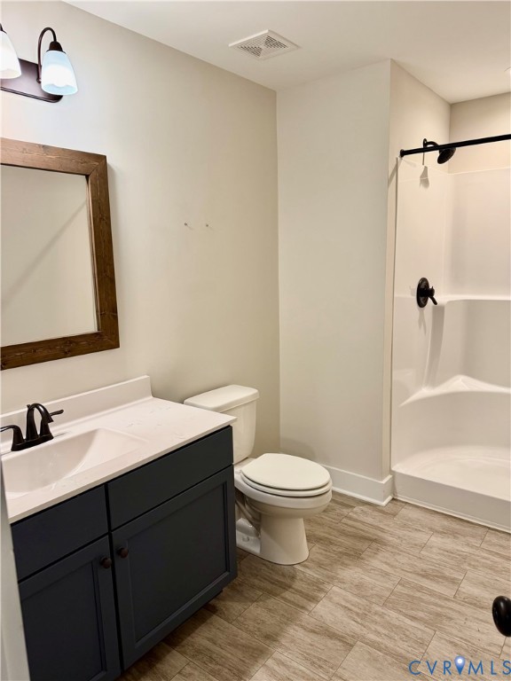 219 Eliza Lane Aylett, VA 23009 - Photo 21 of 21 Bathroom featuring a shower stall and vanity