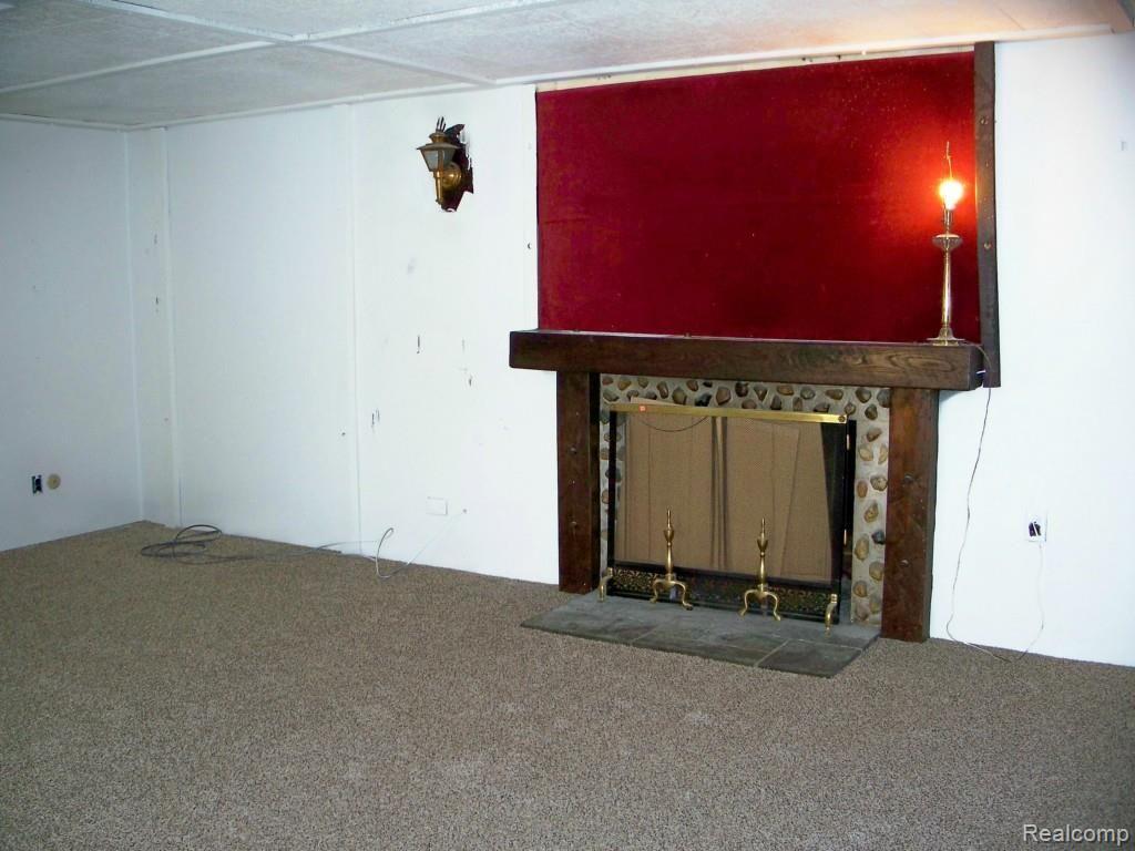 426 Hillview Street Rochester, MI 48306 - Photo 17 of 22 2ND VIEW OF REC ROOM WITH FIREPLACE