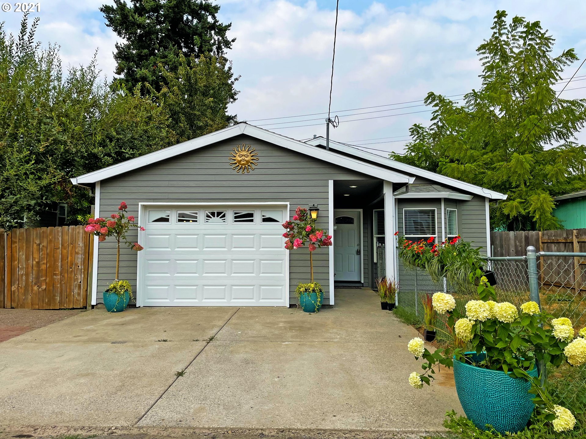 a front view of a house with a garage