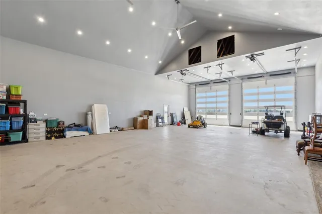 a big room with gym equipment and a large window