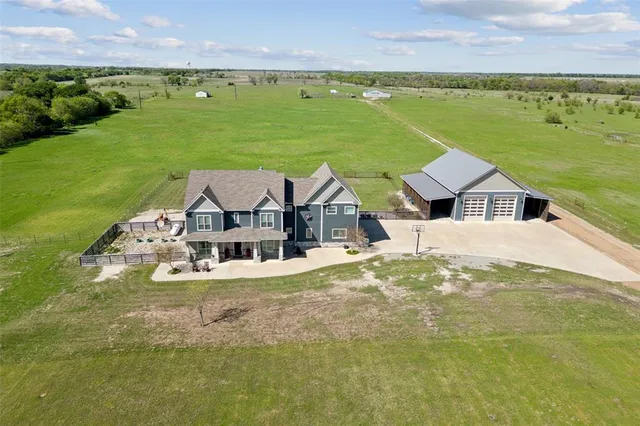 a view of a house with a ocean view