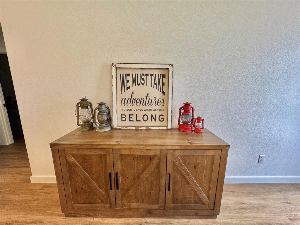 416 Austin Street Gainesville, TX 76240 - Photo 6 of 33 a utility room with a sink