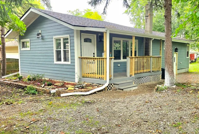 a front view of a house with a porch