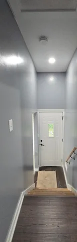 a bathroom with a sink toilet and mirror